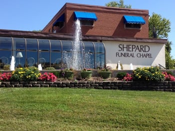 Funeral Home view from Natural Bridge Road and our Memorial Fountain.