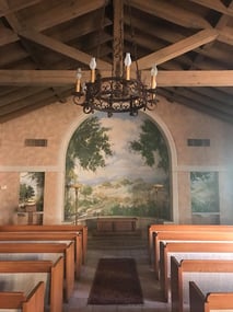 Custom mural and original architecture inside the chapel. 