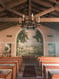 Custom mural and original architecture inside the chapel. 